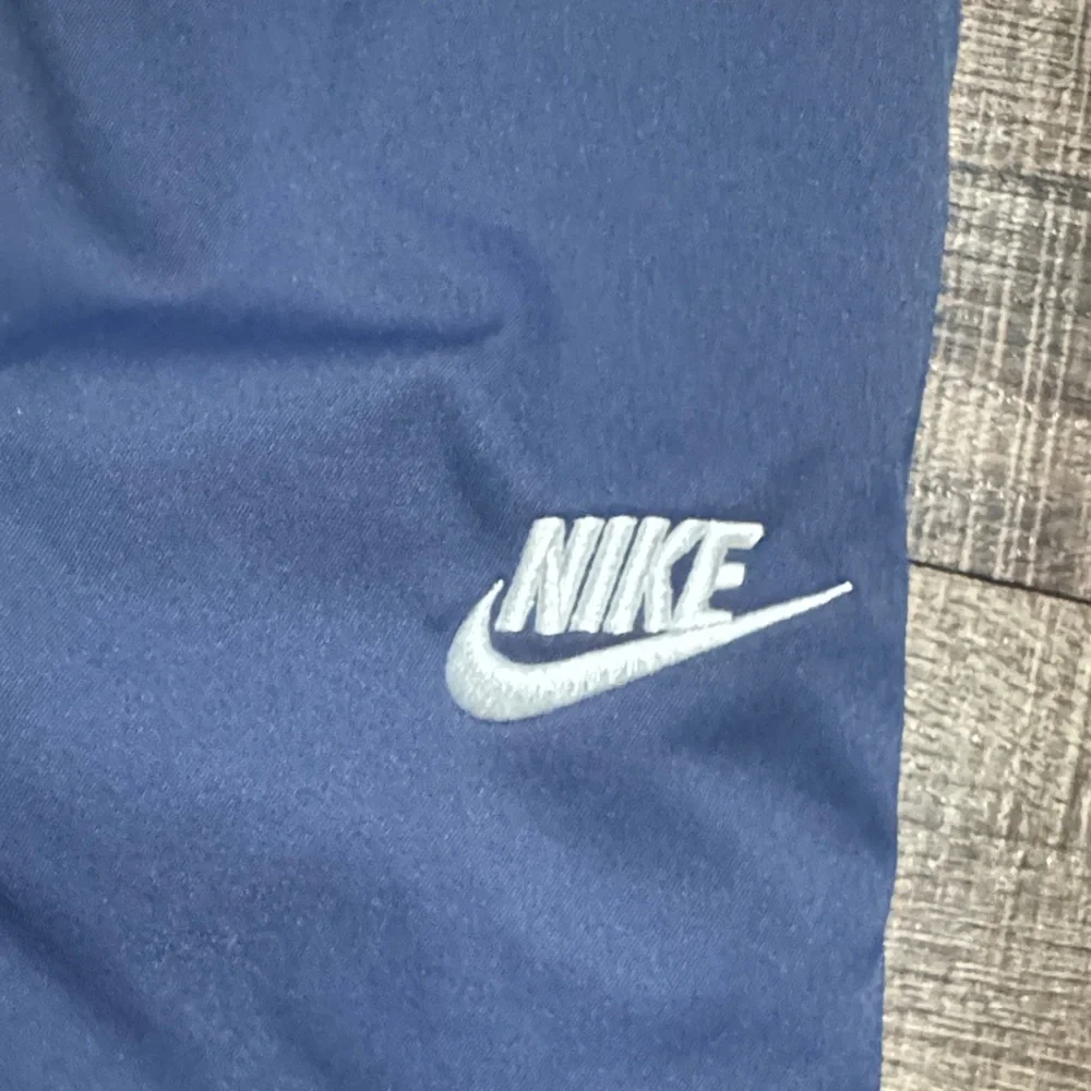 Nike Men's Navy Blue Joggers with White Drawstrings